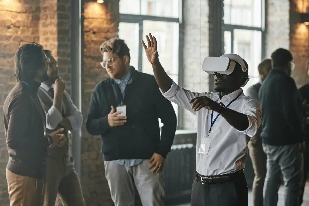 Business professional testing virtual reality headset during a tech networking session.