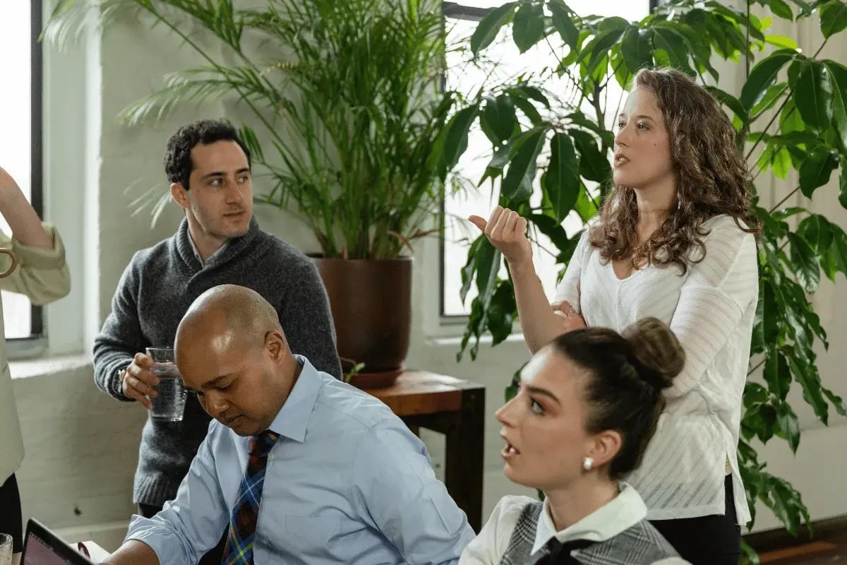 Team having a discussion during office meeting.