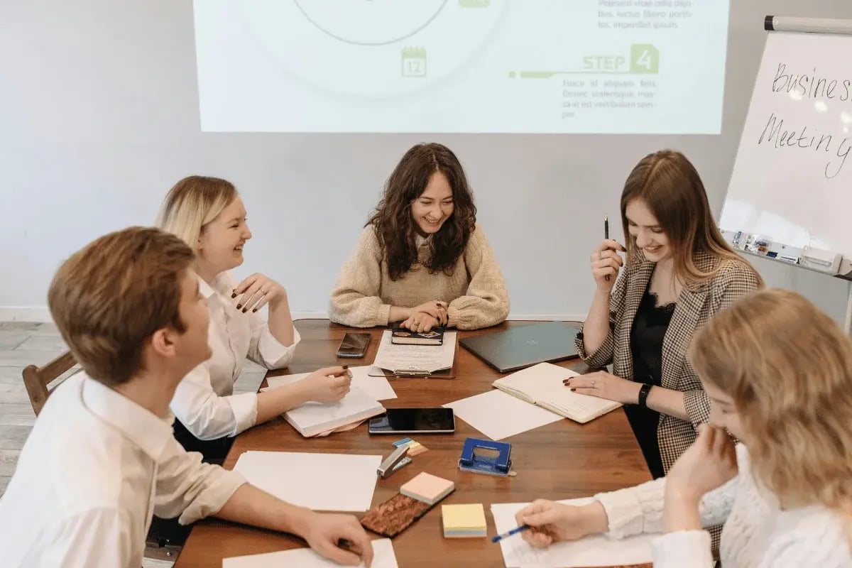 Group of young professionals collaborating during a business meeting.